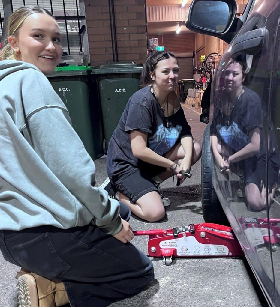 C9 zoe bella changing tire